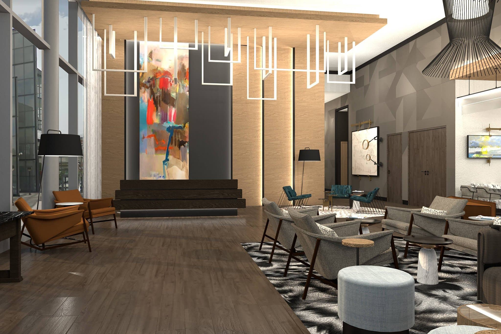 The Catalyst Urban Lounge terrace at night featuring fire pits, modern seating, and a view of the Omaha skyline.